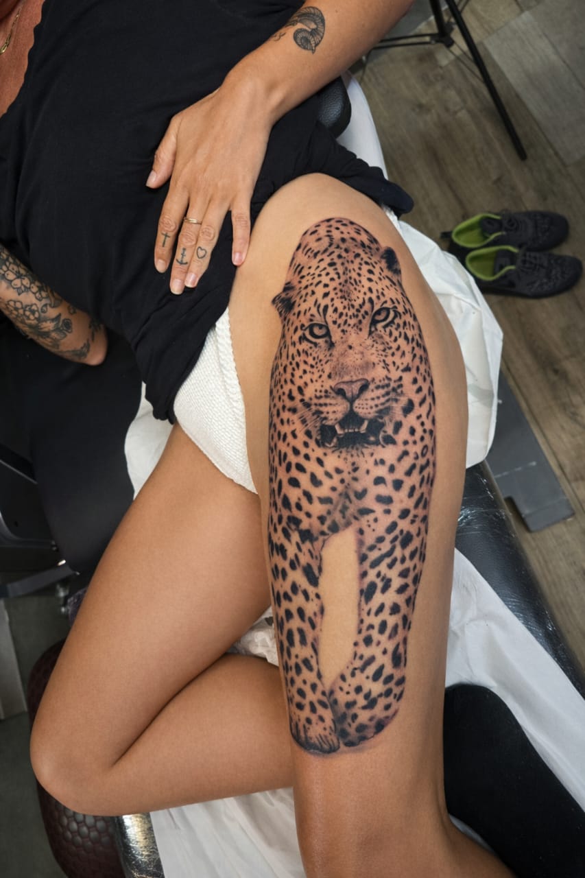Black & Grey realistic leopard on thigh